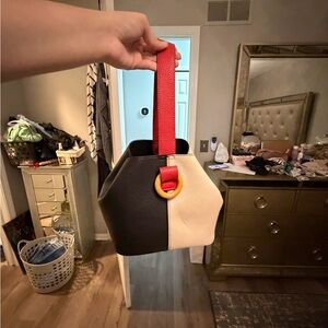 Two-Tone Black and Cream Handbag with Red Strap